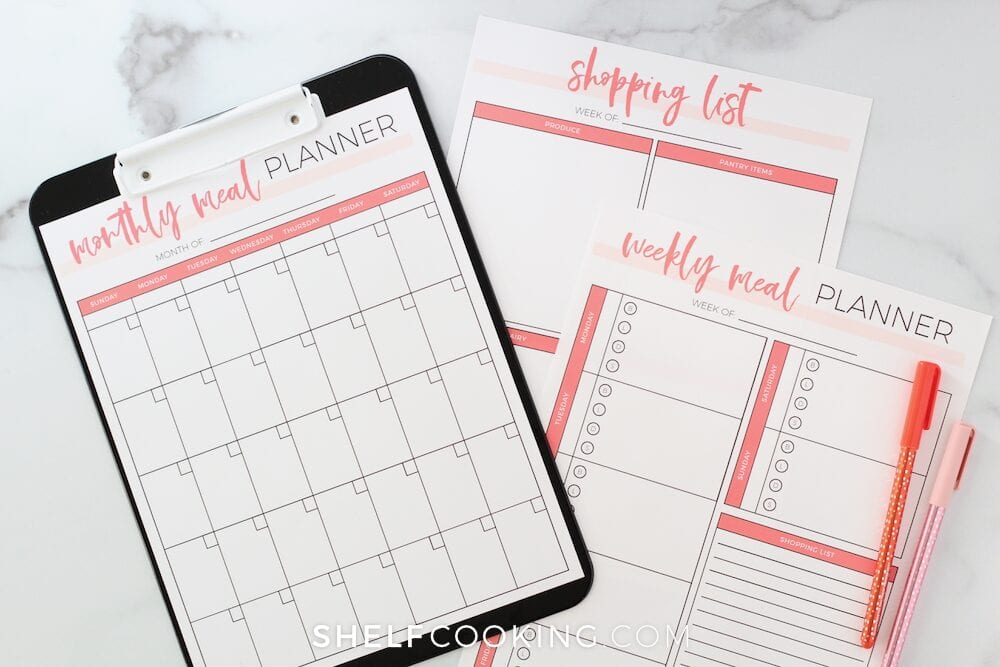 Meal planning sheets on a counter, from Shelf Cooking 