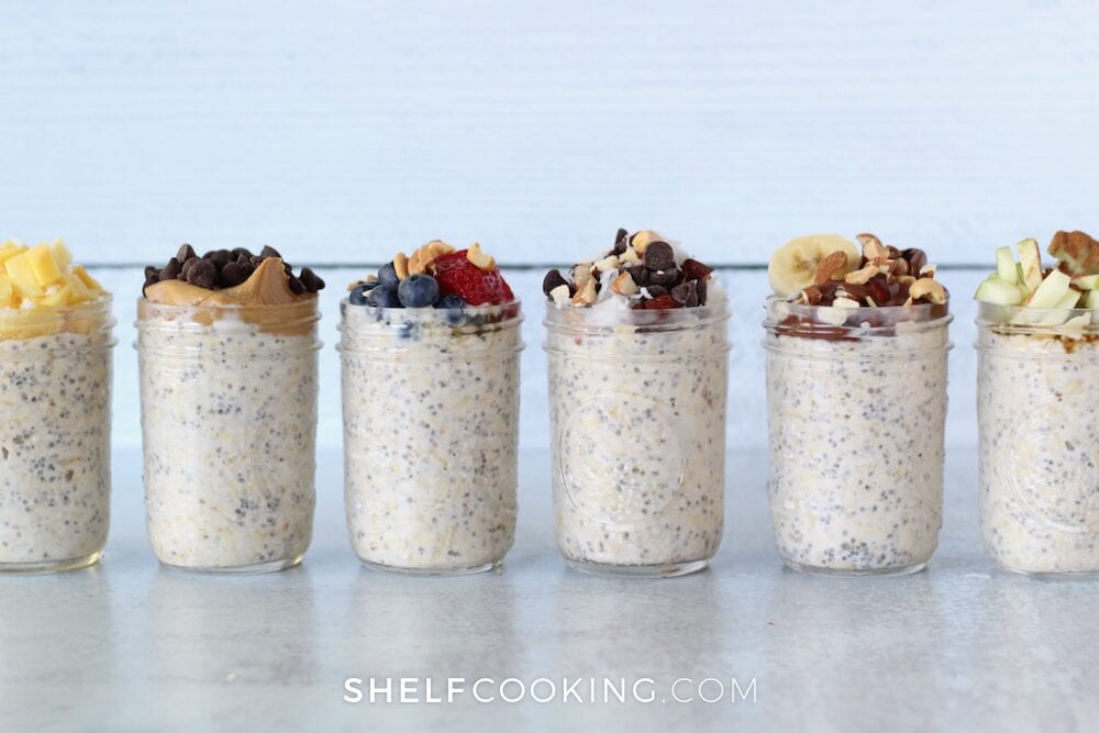 Various overnight oats on a counter representing make ahead breakfast ideas, from Shelf Cooking
