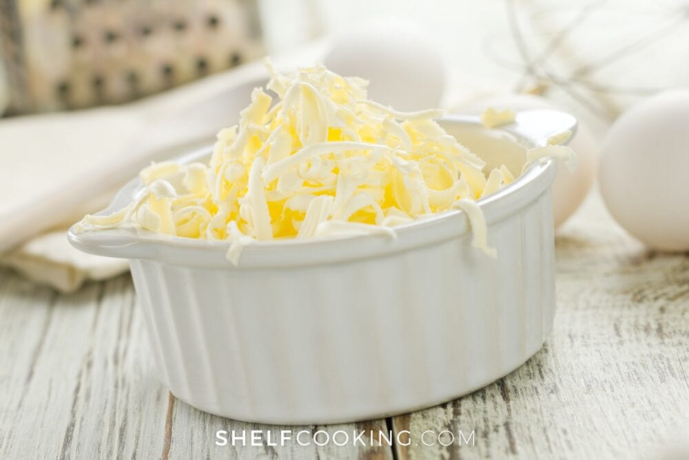 grated butter in a dish, from Shelf Cooking