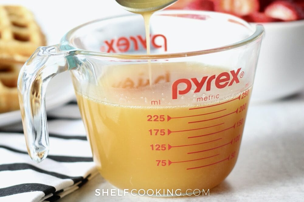 Liquid measuring cup with buttermilk syrup in it, from Shelf Cooking 