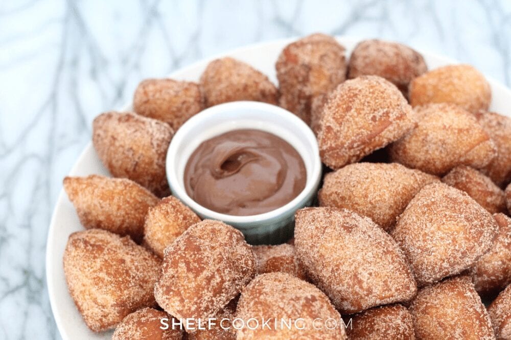 plate of donut holes with chocolate dip, from Shelf Cooking 