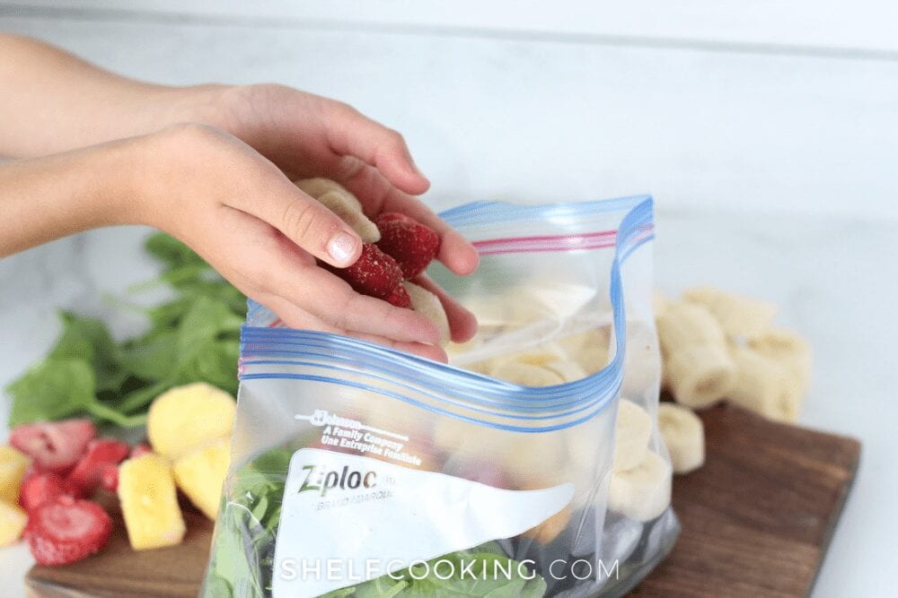assembling freezer smoothie packs, from Shelf Cooking