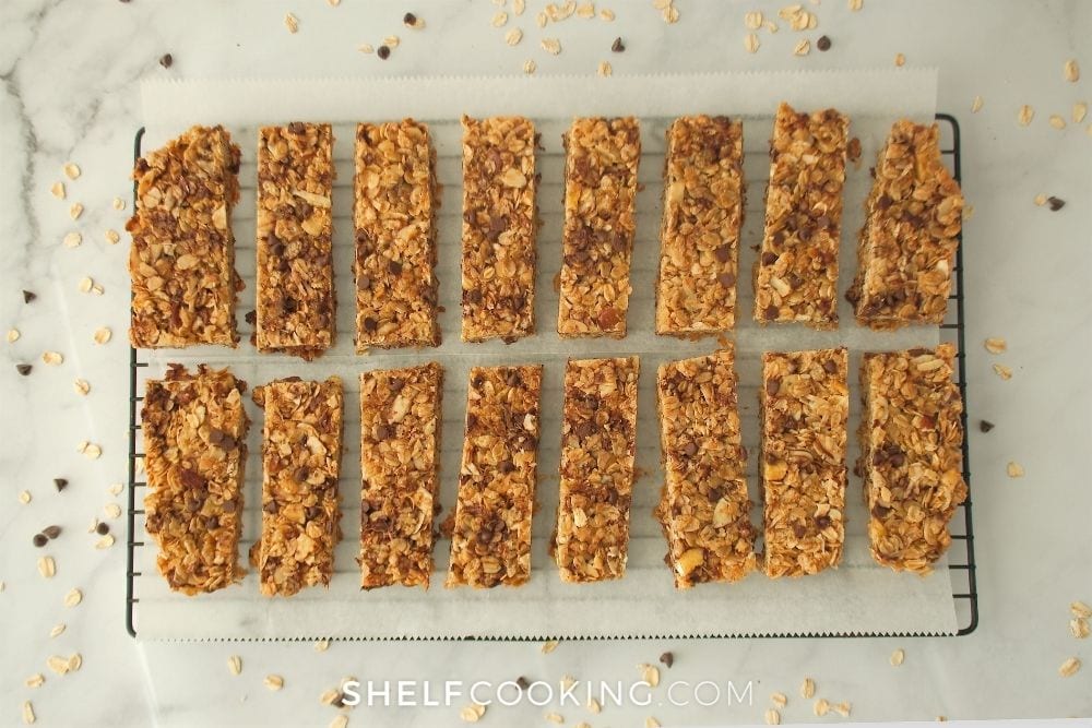 homemade granola bars on a cooling rack, from Shelf Cooking