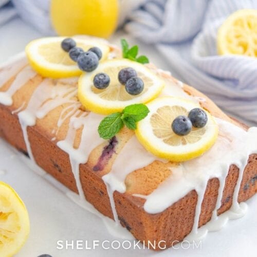 lemon blueberry bread loaf with icing, from Shelf Cooking