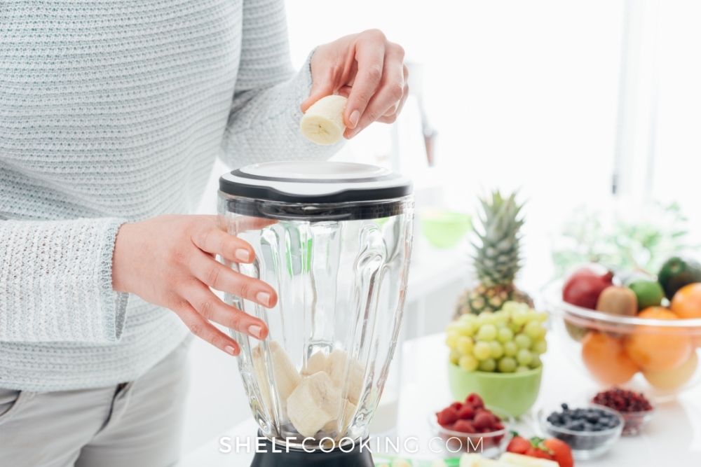 woman using a blender to make smoothies, from Shelf Cooking