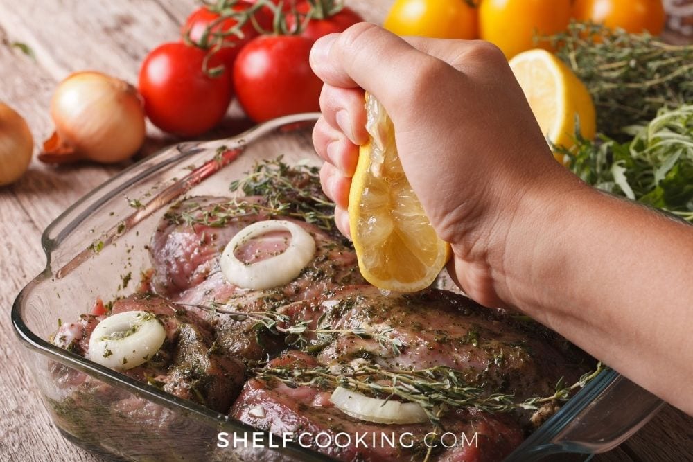 squeezing lemon juice over steak, from Shelf Cooking