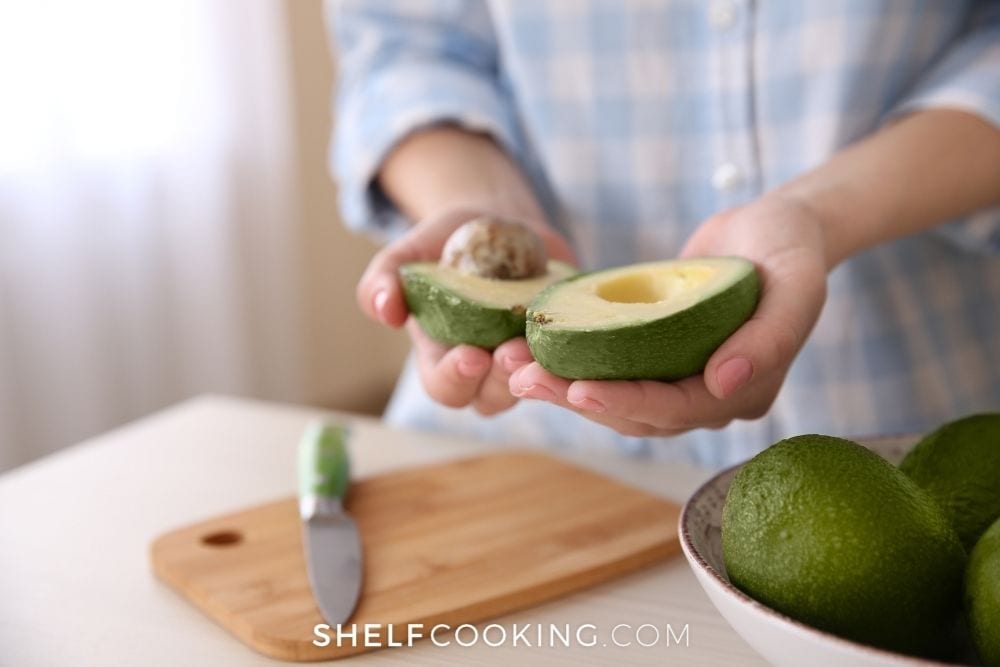 woman slicing an avocado, from Shelf Cooking