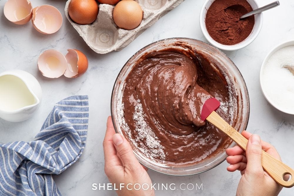 woman mixing chocolate cake batter, from Shelf Cooking