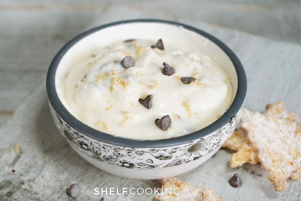 Cannoli dip in a bowl from Shelf Cooking. 