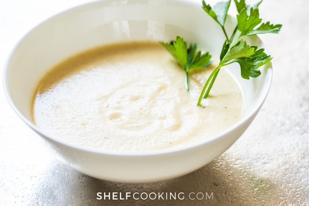 Cream of chicken soup in a bowl from Shelf Cooking.