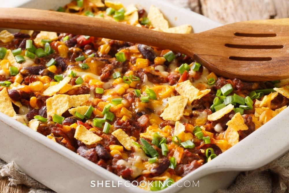 frito chili pie in a casserole dish, from Shelf Cooking