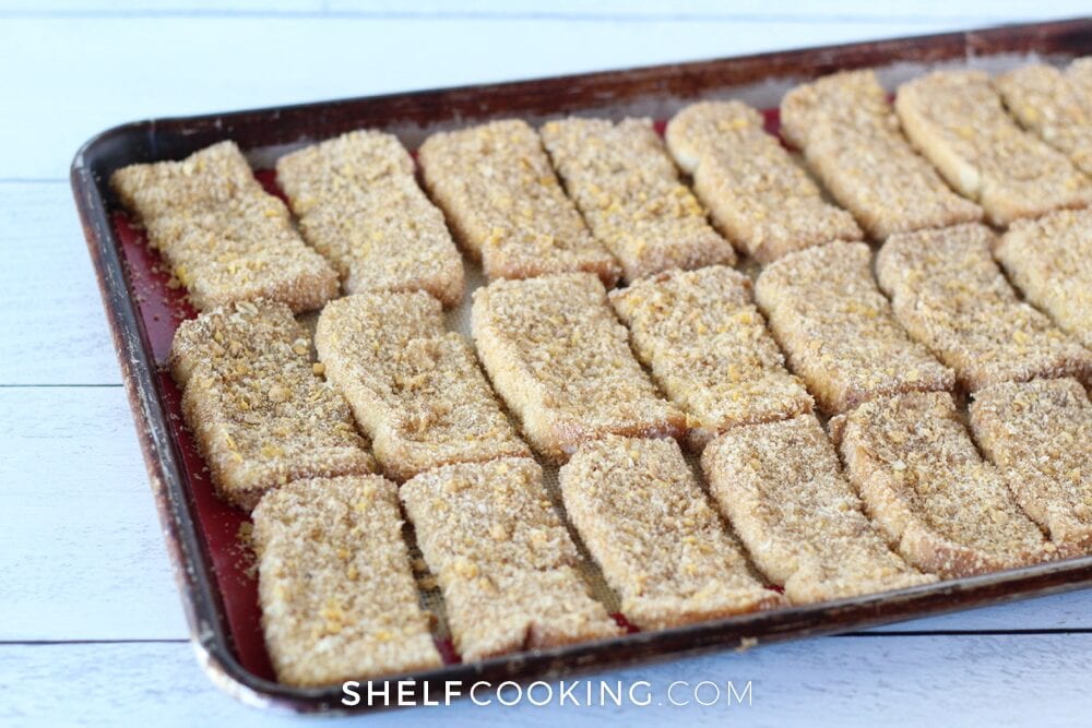 French toast sticks on a baking sheet from Shelf Cooking. 