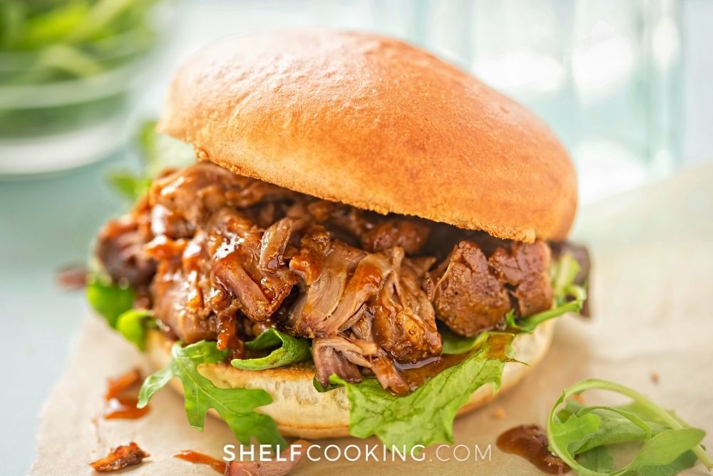 Pulled pork on a slider with arugula from Shelf Cooking. 