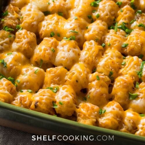 Tater tot casserole in a pan from Shelf Cooking.