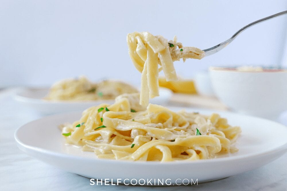 Chicken Alfredo on a plate from Shelf Cooking. 