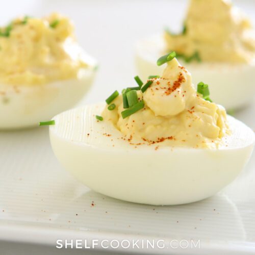 Deviled eggs on white platter