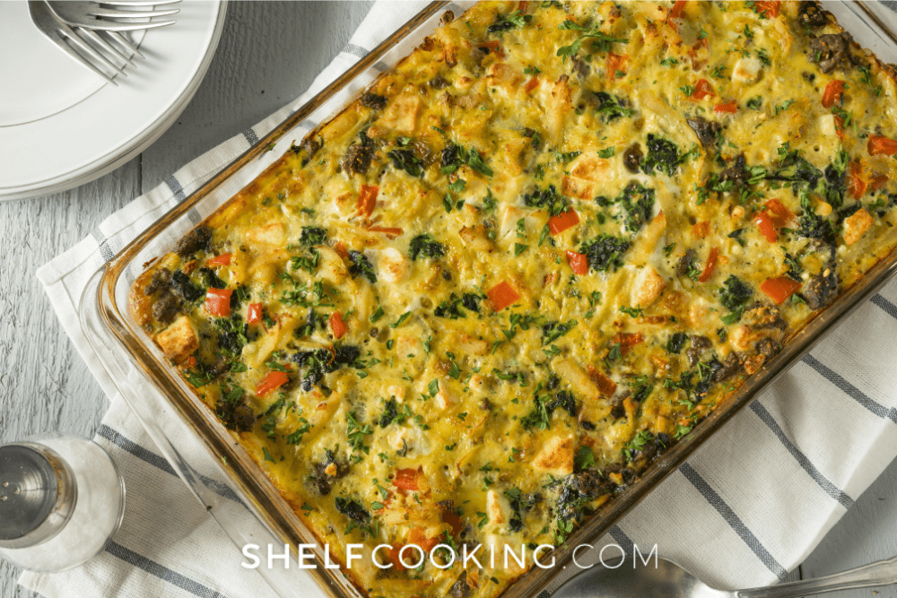 Overhead image of casserole dish with an egg and vegetable breakfast casserole. - Shelf Cooking