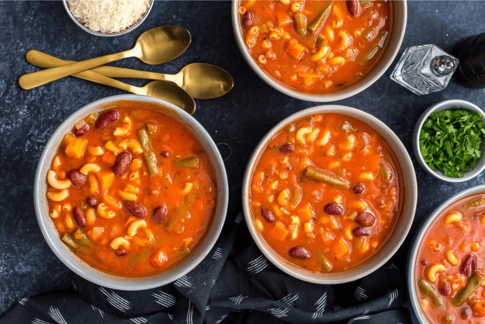 Bowls filled with Instant Pot Minestrone Soup. - Shelf Cooking